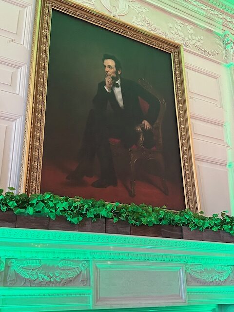 Green Shamrocks adorn the portrait of A. Lincoln hanging in the White House Dining Room